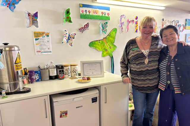 Two of the volunteers at Melton's Pepper's - A Safe Place at the tea and coffee station, which was funded by last year's Ragdale Hall Community Chest