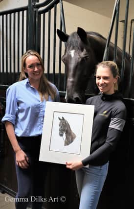 Shoby artist Gemma Dilks presents one of her drawings to top GB equestrian rider, Lottie Fry
PHOTO: Gemma Dilks Art