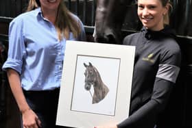 Shoby artist Gemma Dilks presents one of her drawings to top GB equestrian rider, Lottie Fry
PHOTO: Gemma Dilks Art
