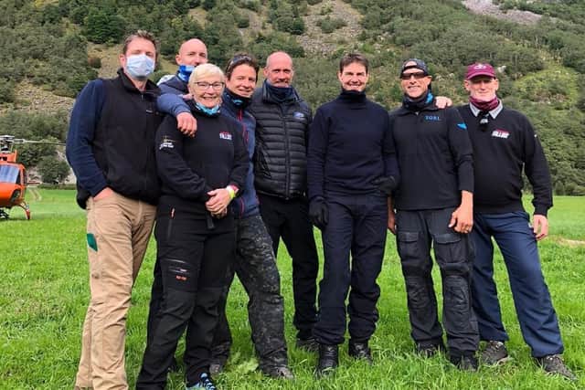Karen Saunders with Tom Cruise and fellow members of the stunt team for Mission Impossible: Dead Reckoning
