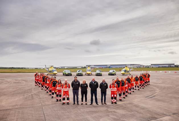 Members of the Derbyshire, Leicestershire and Rutland Air Ambulance service at their Nottingham base