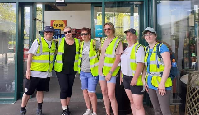 Rob Morrish with colleagues from Morrisons who also took part in the charity walk from the Melton store to the one in Loughborough
