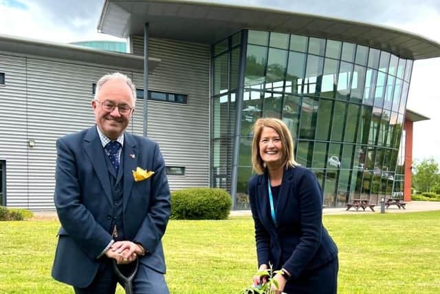 SMB College Group principal, Dawn Whitemore plants a tree for the Queen's Green Canopy scheme with local police and crime commissioner, Rupert Matthews