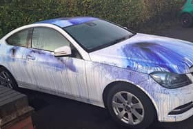 The car in Garden Lane, Melton, which was attacked with blue ink, paint or powder by vandals
