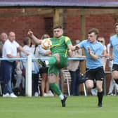 Action from Holwell Sports (in green) at Asfordby on Monday. Photo by Phil James.