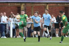 Action from Holwell Sports (in green) at Asfordby on Monday. Photo by Phil James.