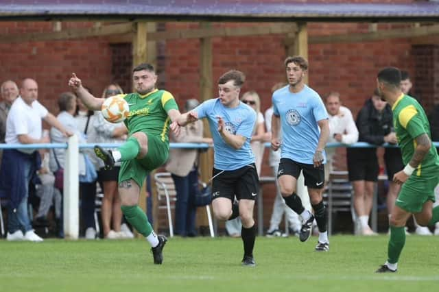 Action from Holwell Sports (in green) at Asfordby on Monday. Photo by Phil James.