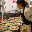 Student chefs at Radmoor Restaurant prepare meals