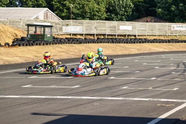 Chase Sharpe crosses the finishing line to win the race.