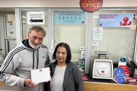 Raj and Yadvinder Bains, with their long service award after running the Post Office at Welby Lane for 30 years