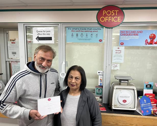Raj and Yadvinder Bains, with their long service award after running the Post Office at Welby Lane for 30 years