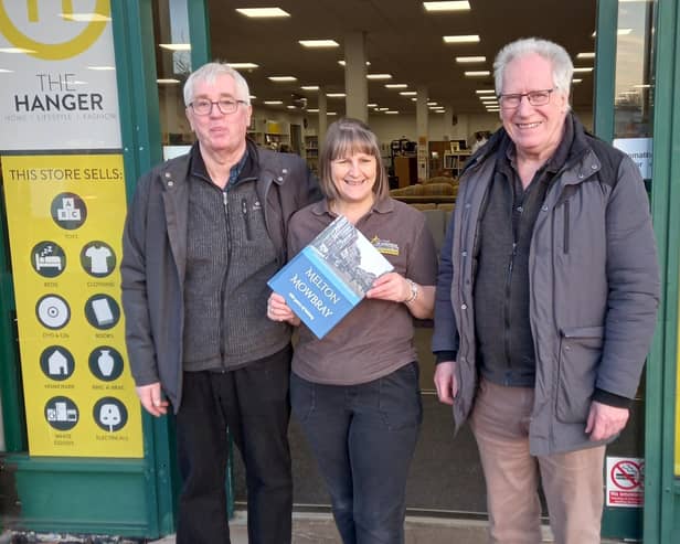 History authors Peter Smith and David Matthews with Kerry Martin, manager of The Hanger, an air ambulance charity store  in Melton Mowbray
