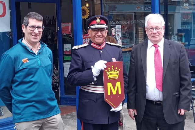 Lord Lieutenant of Leicestershire, Mike Kapur, launches the Royal Mile in King Street, with founder Matthew O'Callaghan (right) and local trader Michael Cooke