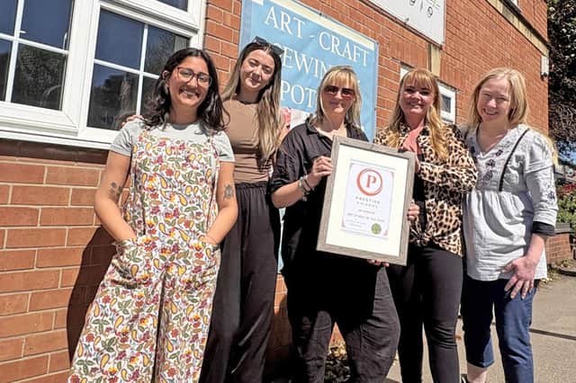 The Kathryn Saunby Art Studio team pictured celebrating being named the best in central England