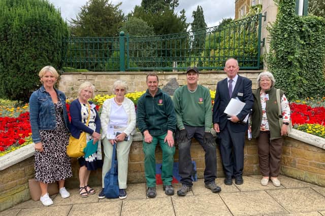 East Midlands In Bloom judges with Melton In Bloom volunteers, Melton Town Estate grounds staff and Melton BID manager, Shelagh Core, by the planting at Memorial Gardens in Melton