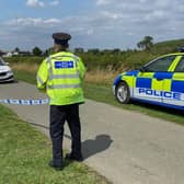 Flashback to July - police activity in Canal Lane, Stathern, after eight children fell ill
