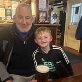 Mike Marshall in the pub with one of his grandchildren