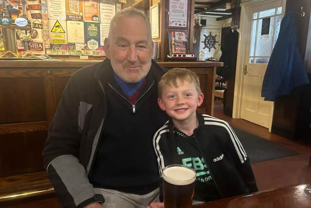 Mike Marshall in the pub with one of his grandchildren