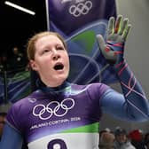 An exhausted Amelia Coltman at the end of the women's skeleton at the Winter Olympics (Photo by Carmen Mandato/Getty Images)