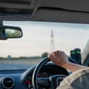 Driving photo by Mark Stuckey on Unsplash