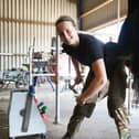 Abbie Robinson, of The King's Troop Royal Horse Artillery), working as a farrier