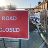 A sign warning of the closure of Thorpe Road