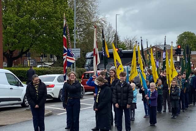 Scout groups prepare to march in the St George's Day Parade on a chilly afternoon in Melton Mowbray