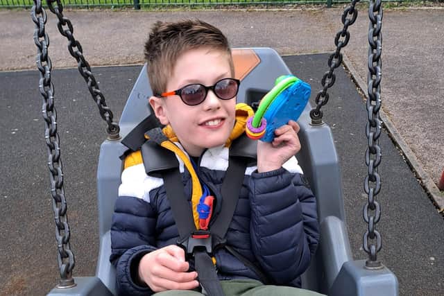 Max Hayden enjoying a session on the swings