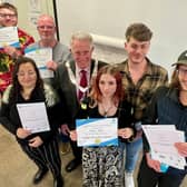Mayor of Melton, Councillor Alan Hewson, with clients of Access All Areas after presenting them with certificates
