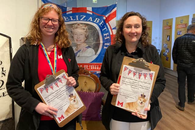 Fiona Crew (left) and Katie Bluett, museum staff at Melton Carnegie Museum, show off the new royal exhibition
