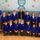 Headteacher Sonia Schofield with some of her pupils at Whissendine Primary School