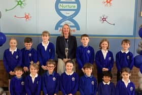 Headteacher Sonia Schofield with some of her pupils at Whissendine Primary School