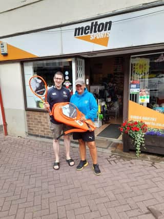 Head Coach Di Burdett receives her Head rackets and holdall from Melton Sports owner Michael Cook