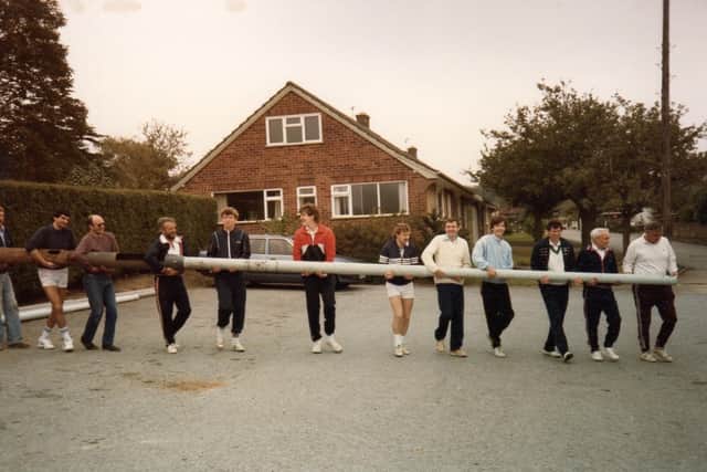Hamilton Lawn Tennis Club celebrates its centenary - putting up the first floodlight posts in 1984, from left: Rod Kay (then chairman), Pete Fisher, Dennis Cox (club manager) Mitch Farquharson, David Barratt, Carl Dennis, Dennis Lowe, David Core, David Gildove, Colin Hughes, Peter Barratt