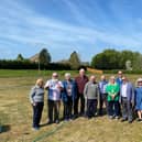 Representatives of Melton Indoor Bowls Club, Melton Learning Hub and Melton Mencap on the old bowls greens where a new woodland leisure facility is planned
