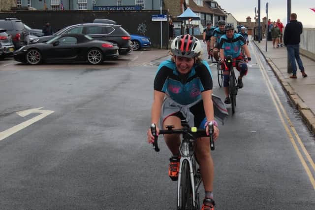 Alice Greaves arrives in Sheringham to raises £85K for cancer research with her cycling fundraiser