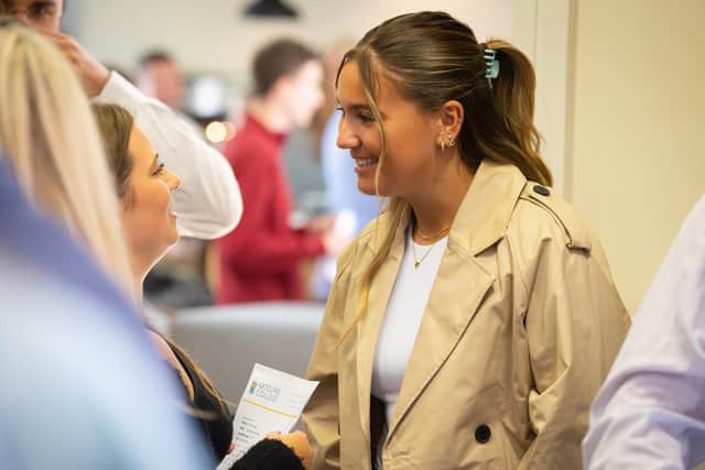 Ratcliffe College students discuss their A-level results yesterday