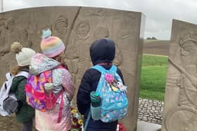Pupils visit the Friends of The Tenth war memorial to the 10th Battalion at Burrough-on-the-Hill