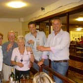 The late Pat Skelton pictured (centre) celebrating her golden wedding anniversary with family members