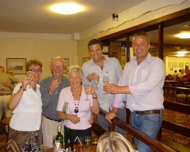 The late Pat Skelton pictured (centre) celebrating her golden wedding anniversary with family members
