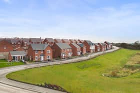 Aerial shot of new homes and public open space at Bellway's Roman Gate development in Melton Mowbray