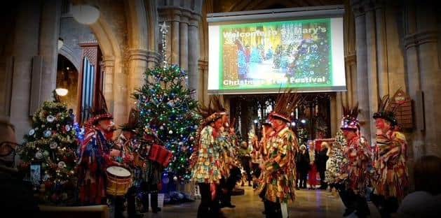 Morris dancing in St Mary's Church during the Christmas tree festival