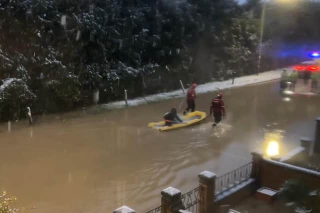 A resident is rescued in Saxby Road, Melton IMAGE Robert Jankowiak