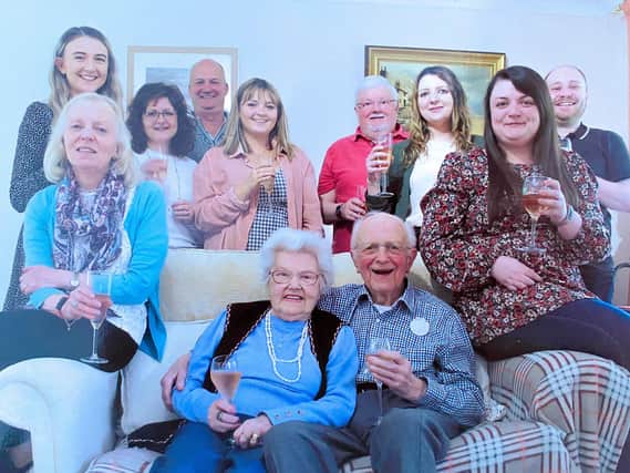 Ken Adlard celebrates his 90th birthday with family members