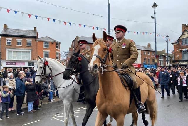 Horses wearing Lynne Jeffery's homemade felt Poppies with mounted soldiers from the DATR at last year's Melton Remembrance parade