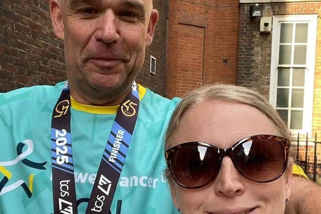 Jon Wolloff poses with his medal after his first London Marathon