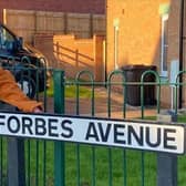 Jean Forbes in the road which was named after her and late husband Bill in Melton