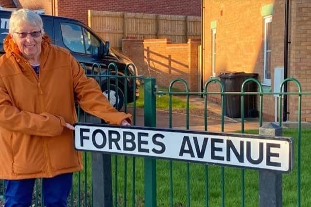 Jean Forbes in the road which was named after her and late husband Bill in Melton