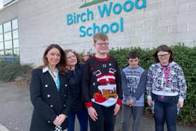 Birch Wood Area Special School executive head Ros Hopkins, who is leaving after eight years, pictured with some of the students