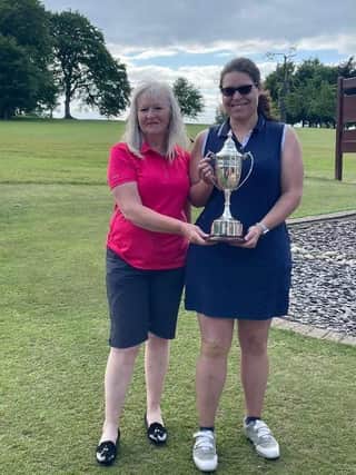 Laura Manton (right) with Lady Captain Jane White.